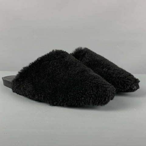 JENNI KAYNE Mules planos de piel de oveja negra talla 7