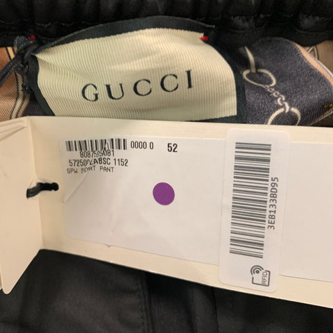 GUCCI Size 36 Black Gold Stripe Acetate Athletic Shorts