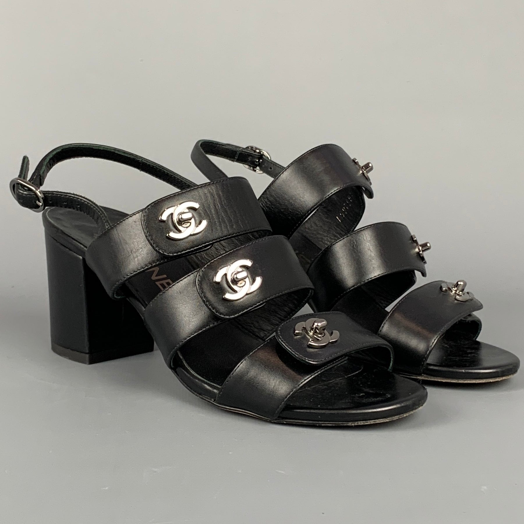 CHANEL Size 6 Black & Silver Leather Turn Lock Logo Chunky Heel