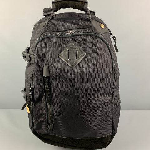 Mochila balística de nailon de 20 L con ribete de ante y materiales mixtos en negro VISVIM
