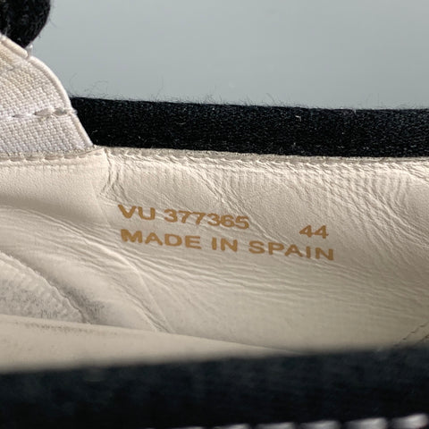 SAINT LAURENT Taille 11 Baskets à enfiler en toile cloutées noires et blanches
