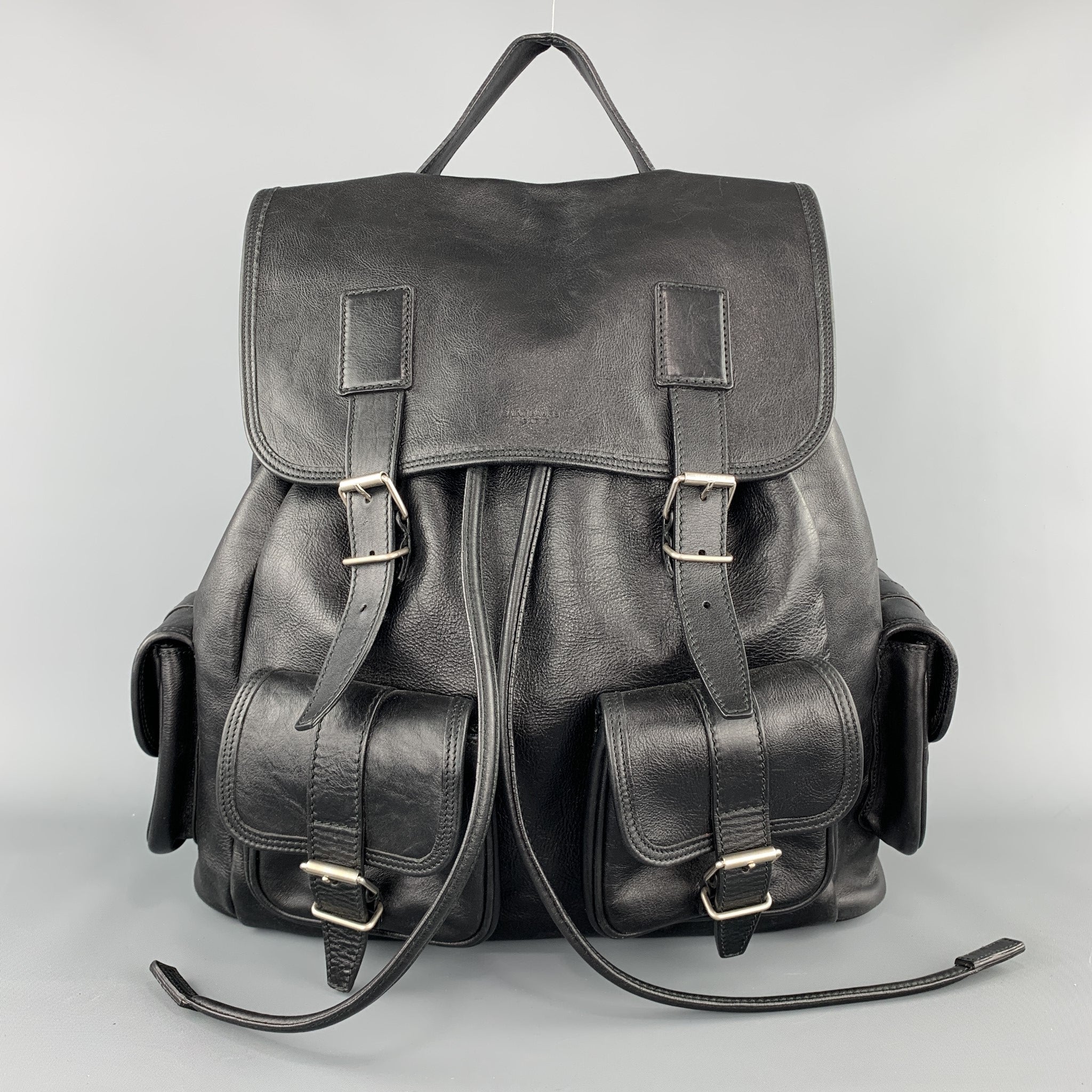 The rock backpack sales leather