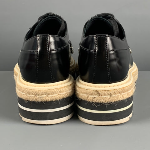 PRADA Talla 7.5 Cordones de plataforma con apliques de cuero negro