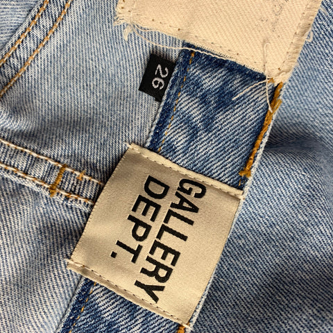 DÉPARTEMENT GALERIE. Taille 26 Jean évasé unique lavé en denim bleu clair redessiné