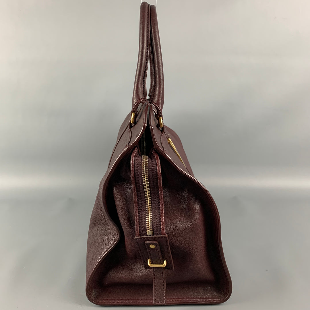 YVES SAINT LAURENT 2012 CABAS Bolso de cuero color burdeos con herrajes dorados
