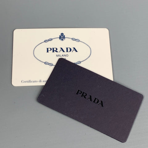 PRADA Sac à bandoulière en cuir crème avec pompon