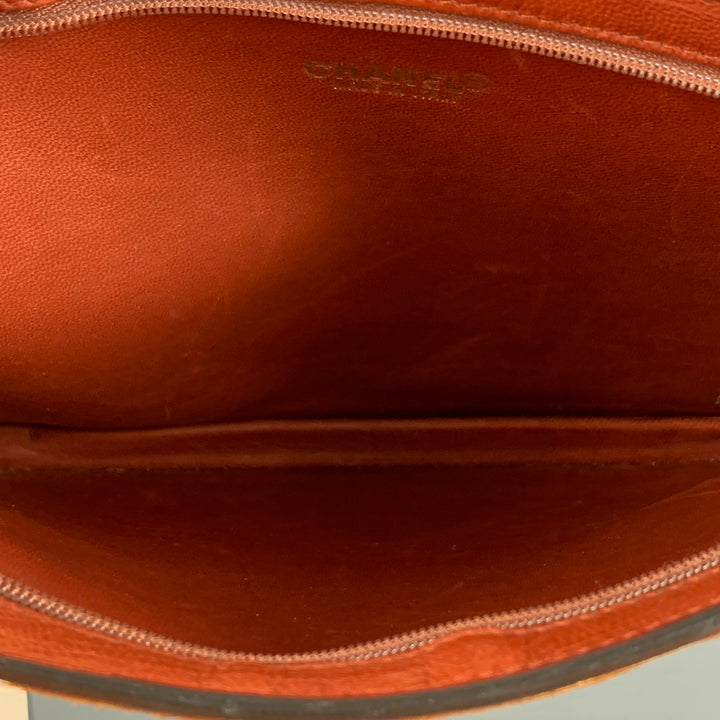 Rare CHANEL Tan COCO Embossed Cowhide Clutch Handbag
