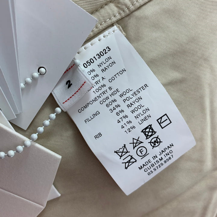 VISVIM Taille S Manteau Valdez Khampa asymétrique en nylon blanc cassé